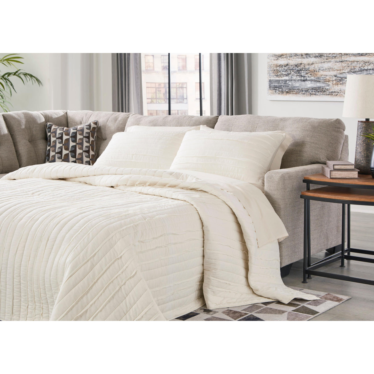 Signature Design by Ashley Mahoney 31004S3 2 pc Sleeper Sectional with Chaise IMAGE 3
