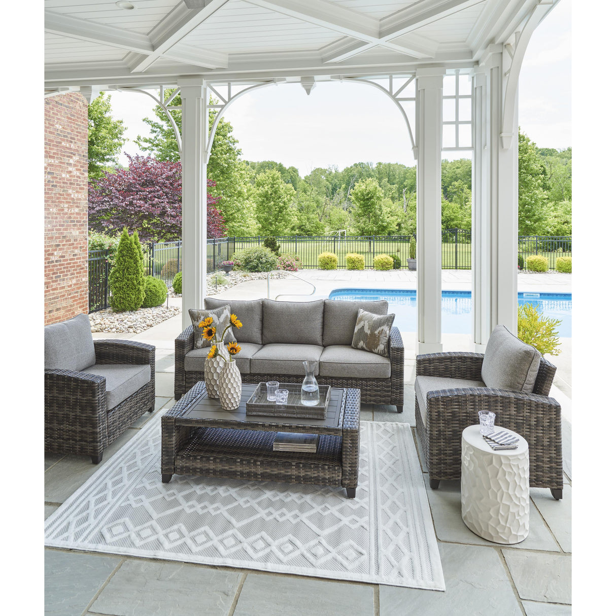 Signature Design by Ashley Oasis Court P335-081 Sofa/Chairs/Table Set IMAGE 11