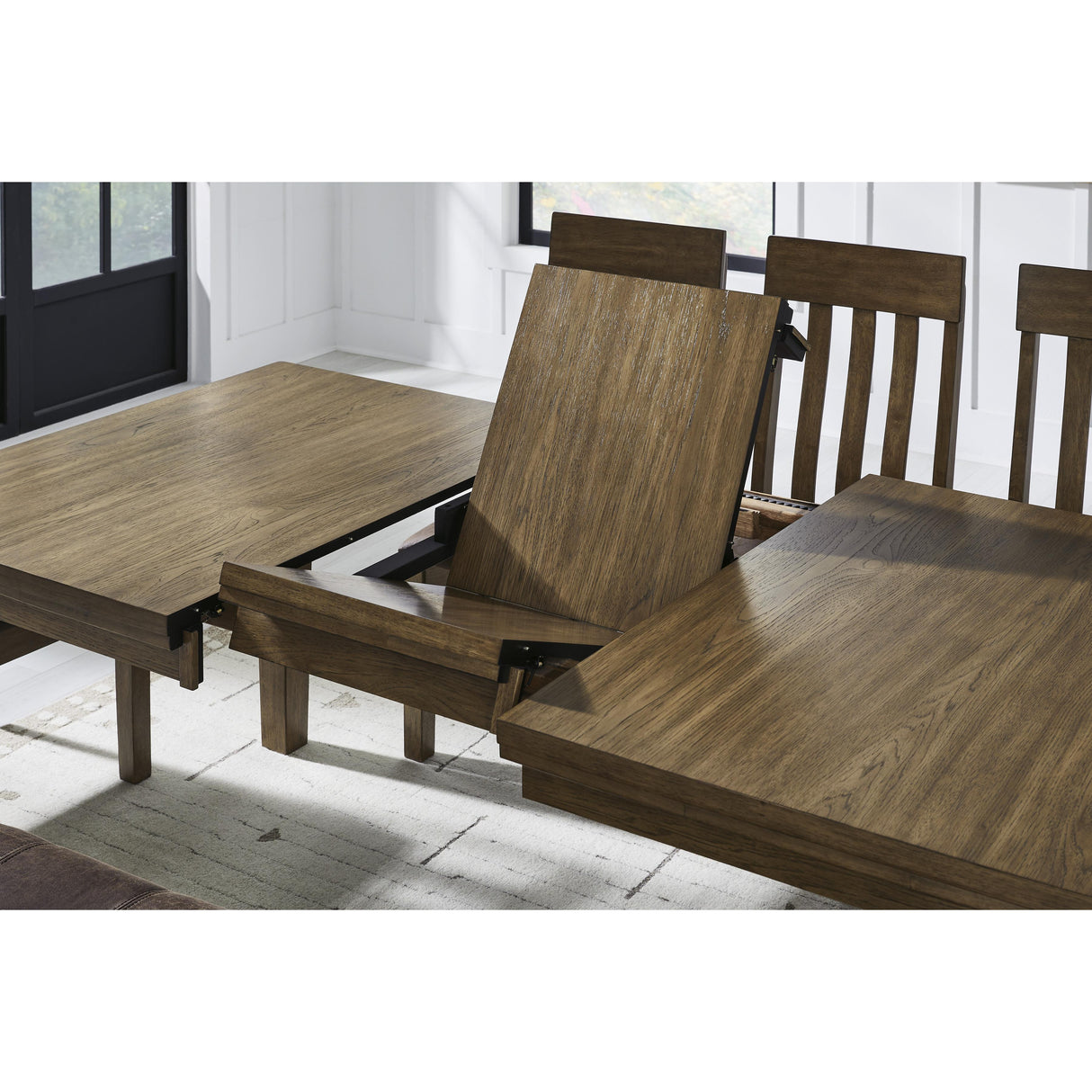 Signature Design by Ashley Urbinforte PCD592-35 Dining Room Butterfly Extension Table IMAGE 7