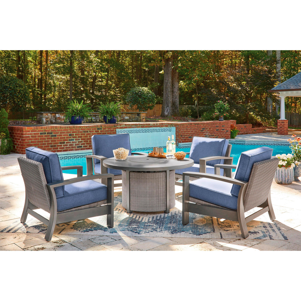 Signature Design by Ashley Half Moon Beach PCP418-776 Round Fire Pit Table IMAGE 11