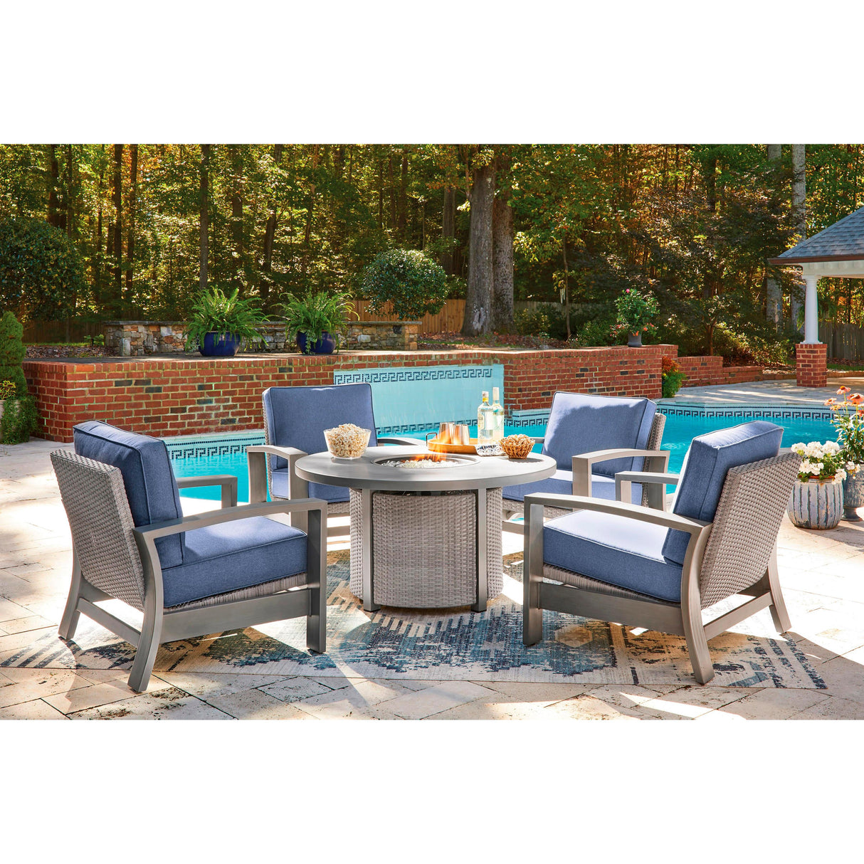 Signature Design by Ashley Half Moon Beach PCP418-776 Round Fire Pit Table IMAGE 12