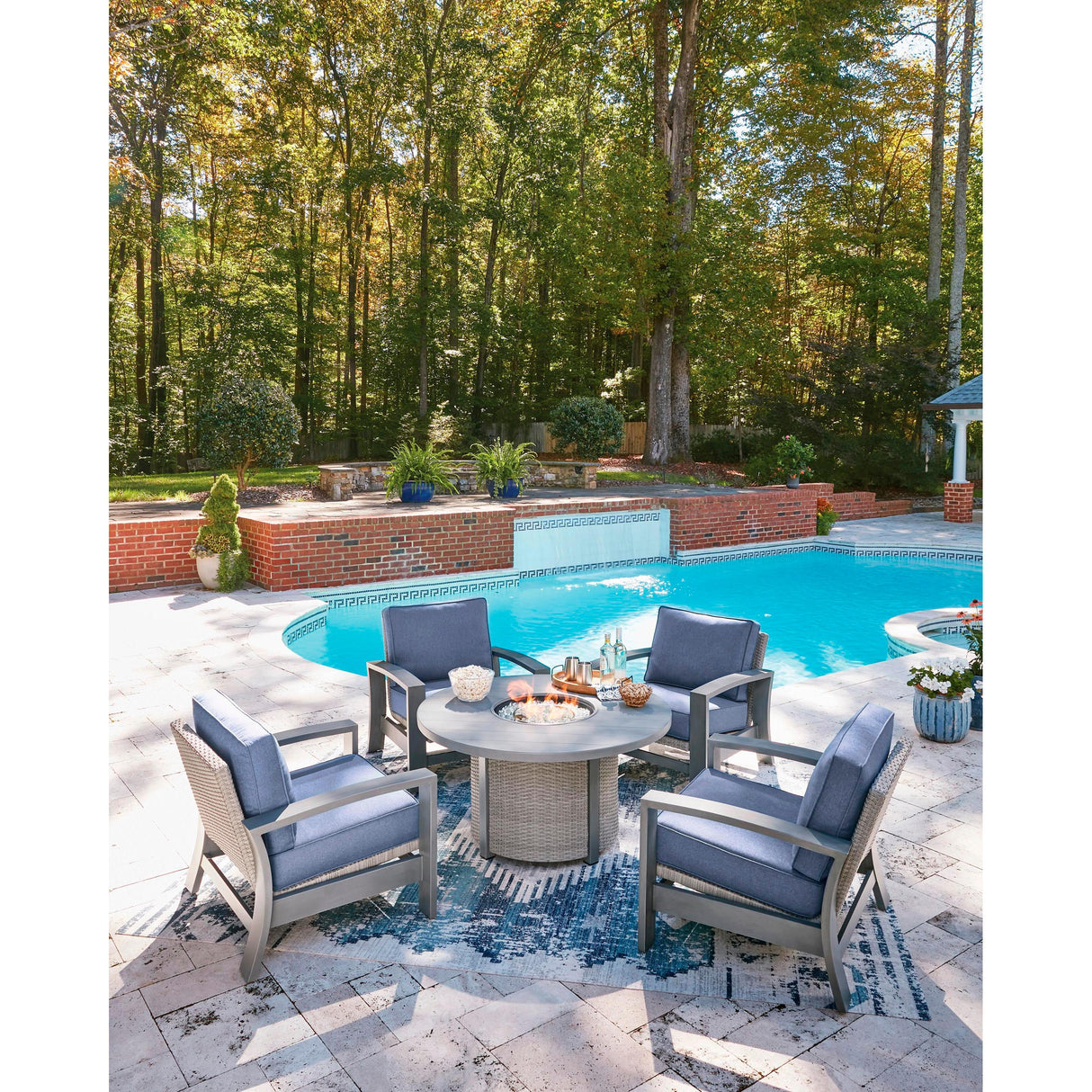 Signature Design by Ashley Half Moon Beach PCP418-776 Round Fire Pit Table IMAGE 8