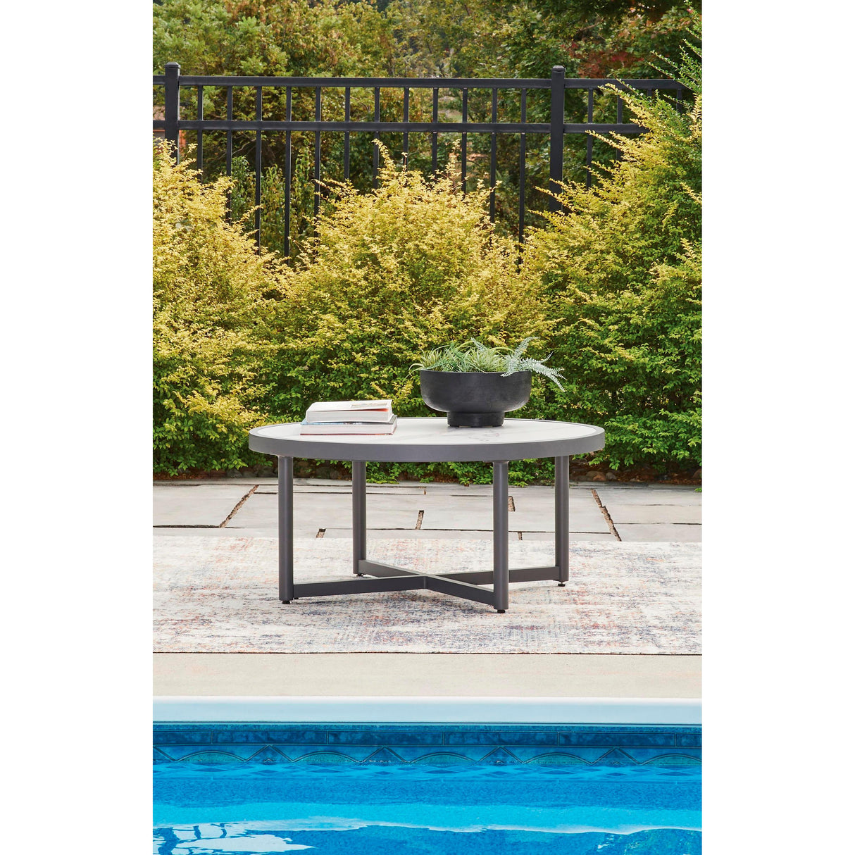  Signature Design by Ashley Ocean Beach PCP510-708 Round Cocktail Table IMAGE 3